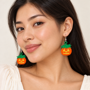 Young adult woman wearing Jack-O-Lantern Embroidered Earrings