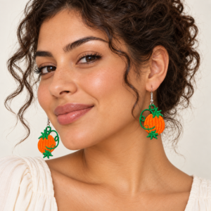 Young adult woman wearing Pumpkin Embroidered Earrings