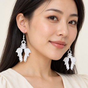 Woman wearing Angel Wing Embroidered Earrings