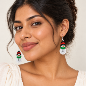 Young adult woman wearing Snowman Embroidered Earrings