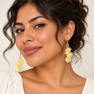 Young adult woman wearing Seahorse Embroidered Earrings