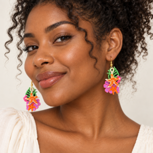 Young adult woman wearing Under the Sea Embroidered Earrings and Starfish Embroidered Earrings 3D
