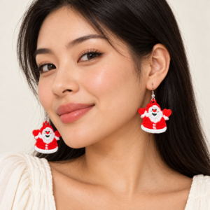 Young adult woman wearing Santa Claus Embroidered Earrings